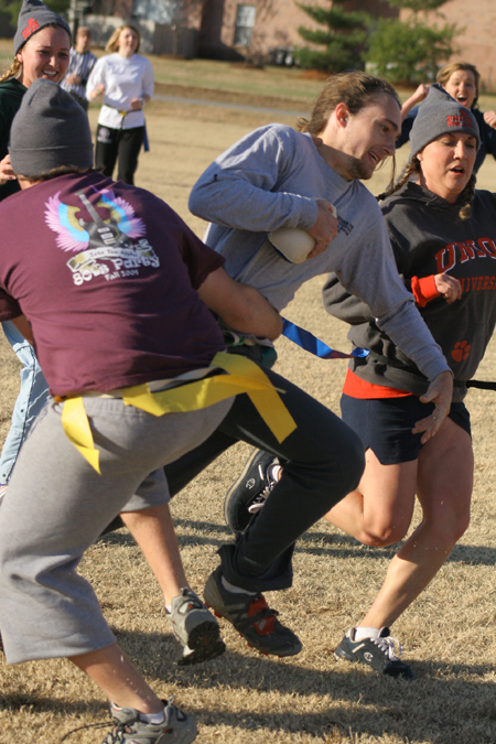 Sophomore D.L. Fruge fights for yardage in the Young Alums' Turkey Bowl. - Photo by Kyle Kurlick