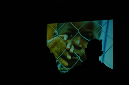 Students gathered in Harvey Hall to learn about human suffering in Africa through the film <em>Invisible Children</em>. - Photo by Kristen Nicole Sayres