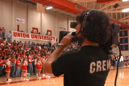 UBS floor cameraman Wes Calvert captures fan reactions during the Lambuth home game. - Photo by Heather Phillips