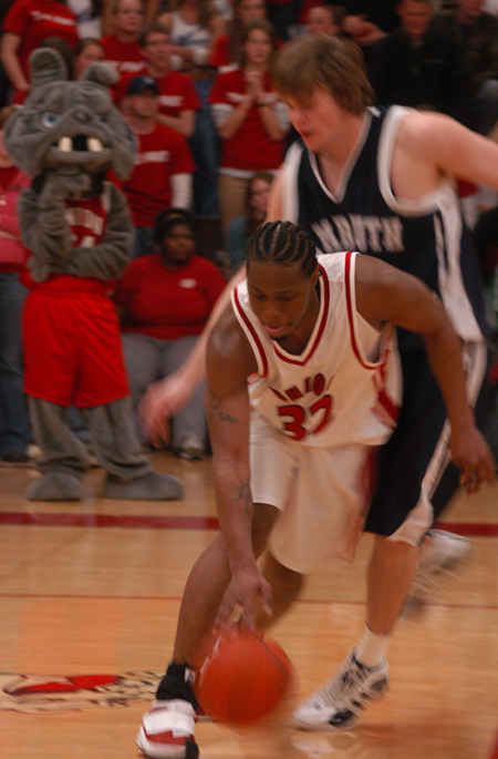 Union's Mack Bealim (32) handles the ball against pressure in Union's win over Lambuth. - Photo by Heather Phillips