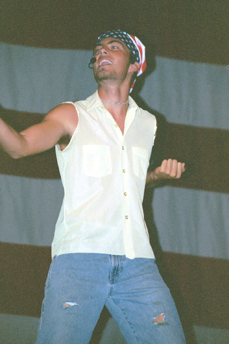 Sophomore Josh Howerton leads the group N*STINK in the Onions' act during the SAC Variety Show. - Photo by Lindsay Stavish