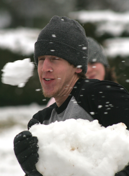 Drew Winter has a close shave with a snowball during a snowball fight. - Photo by Kyle Kurlick