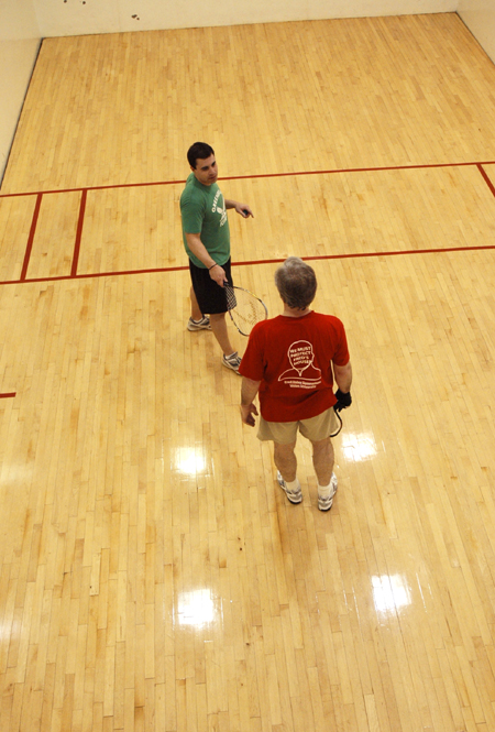 Senior Matt Owen and Jim Veneman, instructor of communication arts, prepare for a game of racquetball. - Photo by Brad Moore