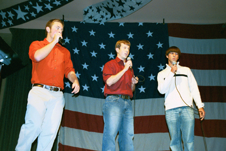Lambda Chi Alphas Josh Huesing, Joel Polk and Adam Fox sing acapella patriotic songs during the SAC Variety Show.
 - Photo by Lindsay Stavish