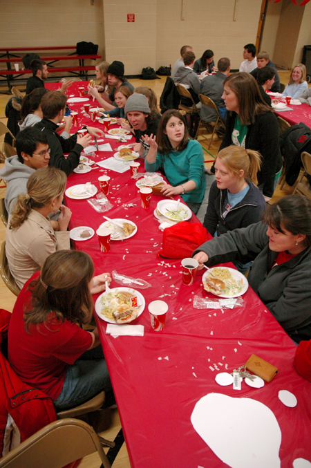 Students socialize during the World's Largest Tailgate Party. - Photo by Brad Moore