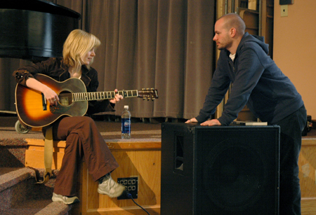 Sandra McCracken spends a few moments with husband Derek Webb before performing in chapel. - Photo by Brad Moore