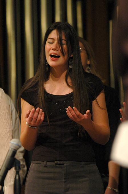 Sarah Santiago-Bullington sings with the gospel choir during chapel. - Photo by Brad Moore