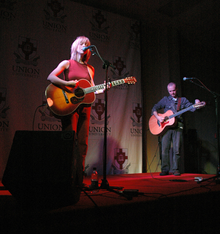 Sandra McCracken performs at the Homecoming Coffeehouse while husband Derek Webb tunes his guitar before joining her. - Photo by Brad Moore