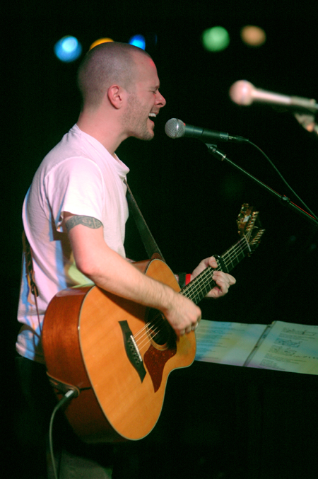 INO recording artist Derek Webb performs at the Homecoming Coffeehouse. - Photo by Brad Moore