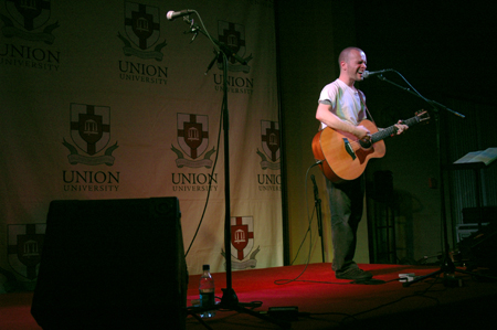 INO recording artist Derek Webb performs at the Homecoming Coffeehouse. - Photo by Brad Moore