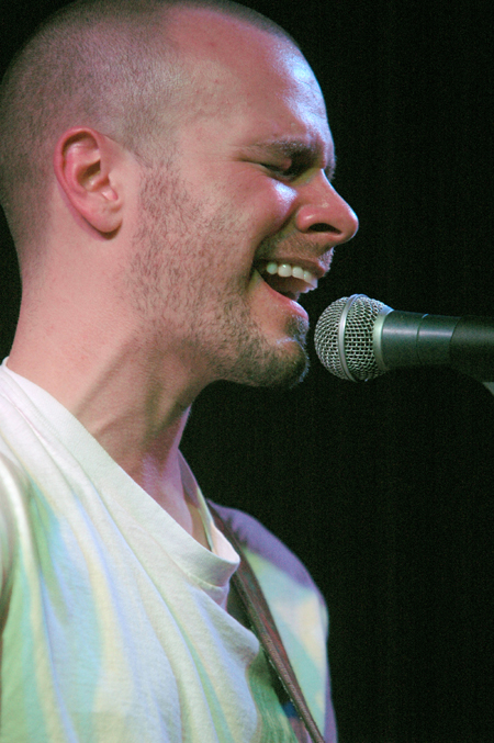 INO recording artist Derek Webb performs at the Homecoming Coffeehouse. - Photo by Brad Moore