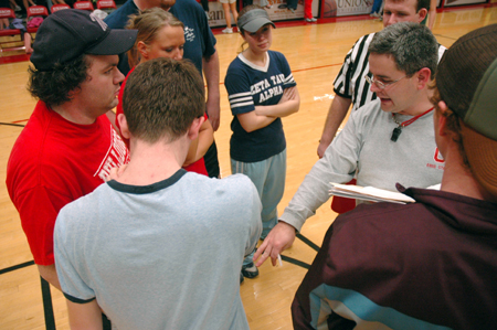 Brandon Boylan, asst. director of wellness, explains the rules of a wild and wacky game to the team captains. - Photo by Brad Moore