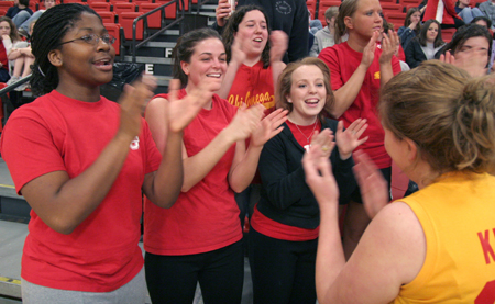 A Chi Omega group cheers for their team during the Wild and Wacky Homecoming Games. - Photo by Kyle Kurlick