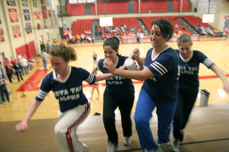 A group of Zetas make their way up the bleachers during the Wild and Wacky Homecoming Games. - Photo by Kyle Kurlick