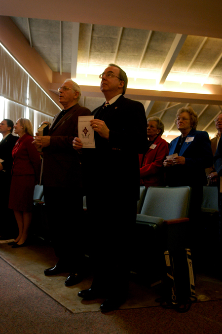 President Dockery and Dr. Phil Jett, pastor of Englewood Baptist Church and president of the TBC, stand during the opening praise time of the Homecoming chapel. - Photo by Heather Phillips