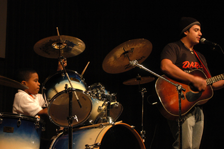 Stephen Fryrear peformed with drumming prodigy Marcus during the Variety Show. - Photo by Heather Phillips
