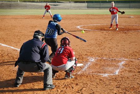 Senior pitcher Mary Kosco fires a pitch to Bonnie Rooney of Lindsey Wilson College during game one of a double-header. Kosco pitched a one-hitter in the game, en route to a 2-0 victory for Union. - Photo by Brad Moore