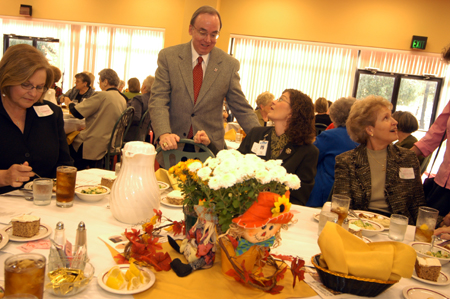 President David S. Dockery visits with members Ann Singleton and Vicki Lake at the Union Auxiliary Fall Luncheon. - Photo by Morris Abernathy