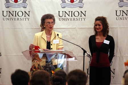 Scholarship Committee Chair Louise Bentley introduces scholarship recipient Jessica Campbell. - Photo by Morris Abernathy