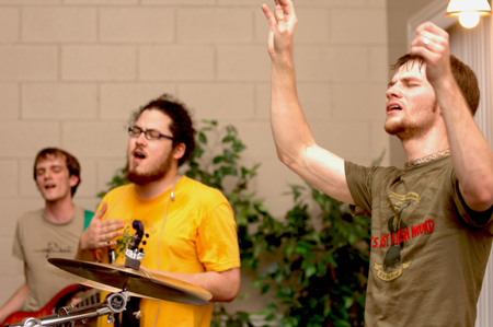 Tyler Malone, Allan Wong, and Jesse Florida of Greenwood worship during 'Sing Alleluia' at the Welcome Back Concert - a time that Union welcomes back its own for a night of music and discussion. - Photo by Brad Moore
