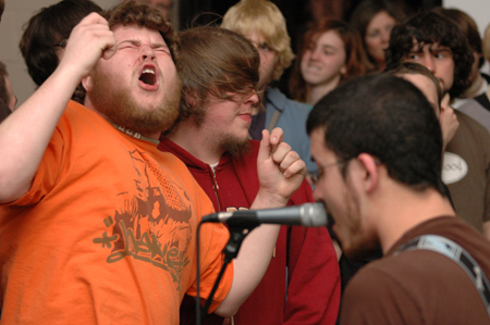 Greenwood's biggest fan, Mitchell Manley, ignites the crowd with excitement during the Welcome Back Concert - a time that Union welcomes back its own for a night of music and discussion. - Photo by Brad Moore