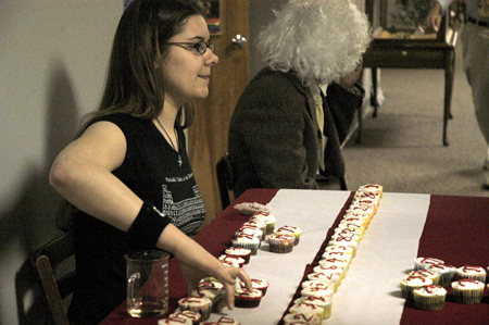 Amber Roberts hands out cupcakes containing multiple digits of pi on Pi Day 2006. - Photo by Stephanny Rodriguez