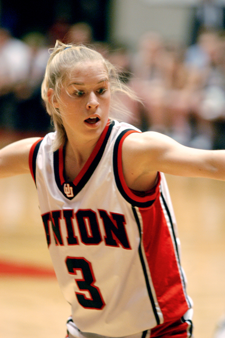Sophomore guard Crystal Eason reacts to a play on defense during Union's run to the championship game in the NAIA National Tournament. - Photo by Brad Moore