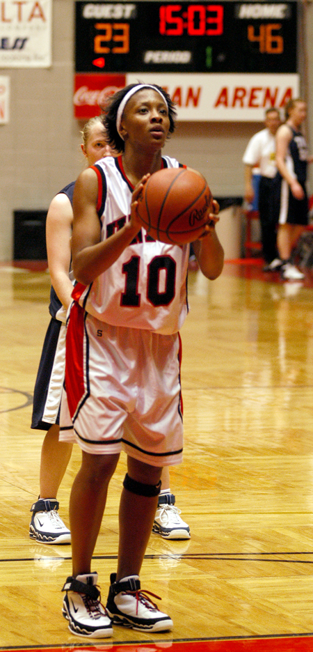 Ena Daniels concentrates from the free throw line during a victory over The Master's College. - Photo by Brad Moore