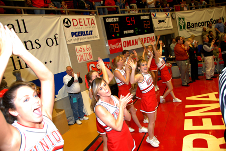The cheerleading squad celebrates as the final seconds of the Women's Basketball National Championship Game ticks away. - Photo by Morris Abernathy