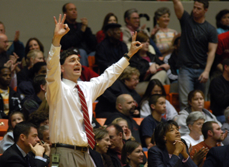 Head Coach Mark Campbell calls a play from the sidelines during the NAIA Women's Basketball National Championship Game.  - Photo by Jim Veneman