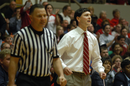 Head Coach Mark Campbell shows intensity from the sidelines during the NAIA Women's Basketball National Championship Game.  - Photo by Jim Veneman