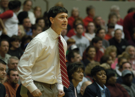 Head Coach Mark Campbell shows intesity from the sidelines during the NAIA Women's Basketball National Championship Game.  - Photo by Jim Veneman