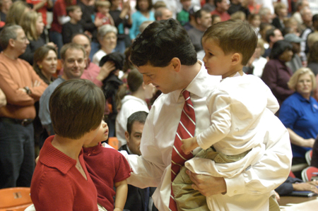 Lady Bulldogs head coach Mark Campbell joins his family to celebrate a 79-62 victory over Lubbock Christian that earned Union a second consecutive NAIA national championship. - Photo by Jim Veneman
