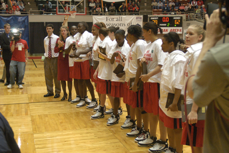 Union University's Lady Bulldogs line up to receive national championship accolades after their 2006 victory over Lubbock Christian at Oman Arena. - Photo by Jim Veneman