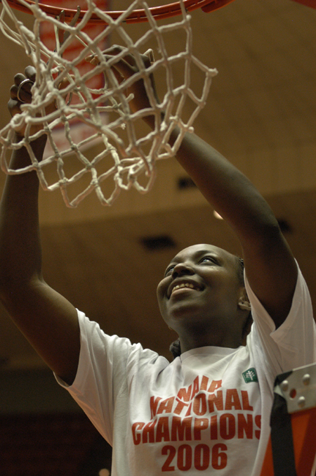 D.J. Sissoko cuts down a piece of the net following Union's 79-62 win over Lubbock Christian in the 2006 NAIA National Championship Game. - Photo by Jim Veneman