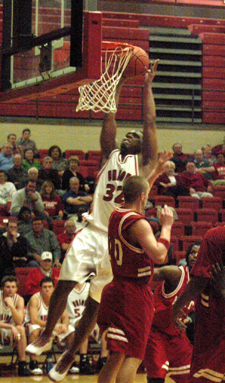 Mack Bealim (32) goes up to finish of a dunk in Union's win over Martin Methodist. - Photo by Steven Aldridge
