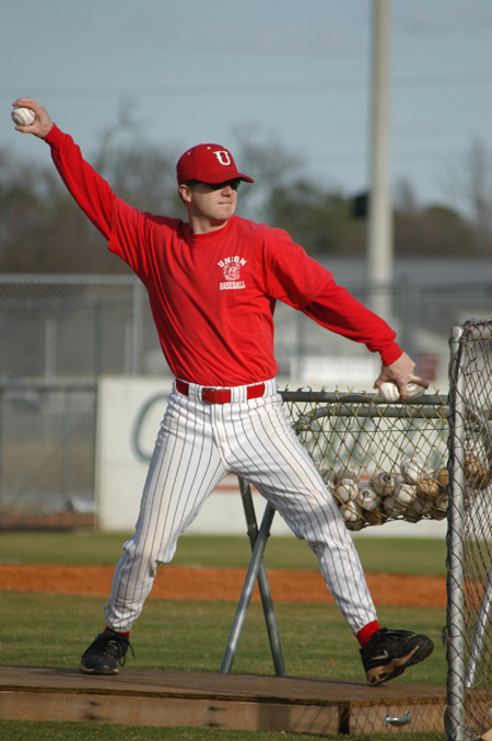 Graduate Assistant Coach David Canary throwing batting practice. - Photo by Steven Aldridge