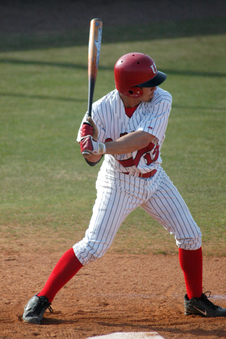 Josiah Enyart starts his swing in an at bat during Union's sweep of Mid-Continent College (Ky.). - Photo by Steven Aldridge