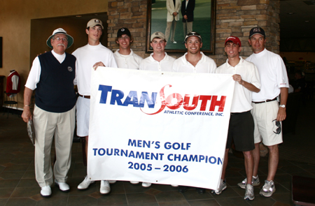 The Union University men's golf team holds their 2006 TranSouth Conference Championship Banner following their one shot victory at the Hermitage Golg Club in Nashville, Tennessee. - Photo by Uncredited