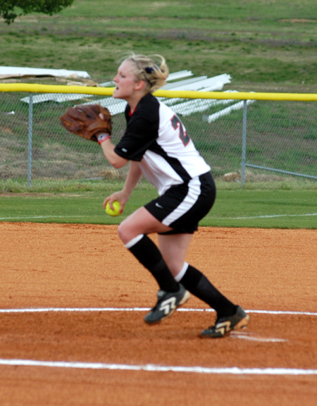 Senior pitcher Mary Kosco starts her windup and delivery in a home game during her final season. - Photo by Steven Aldridge