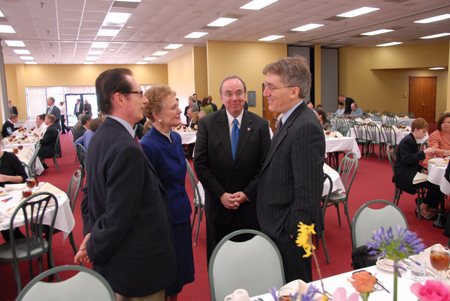 Ron and Jan Boud and President Dockery visited with Robert George before his Union Forum address. - Photo by Morris Abernathy