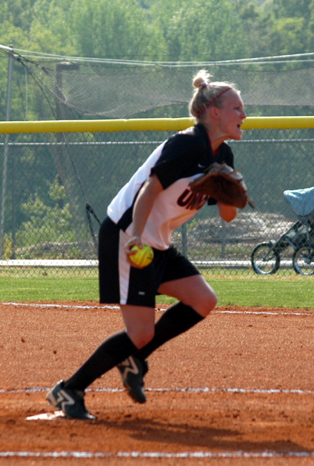 Senior pitcher Mary Kosco in the middle of her delivery in Union's win over Martin Methodist. - Photo by Steven Aldridge
