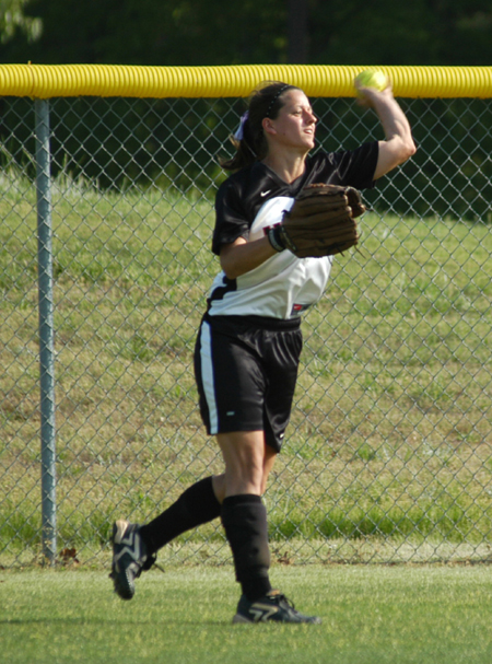 Senior centerfielder Holly Haycraft throws the ball back in to the infield after chasing down a flyball. - Photo by Steven Aldridge