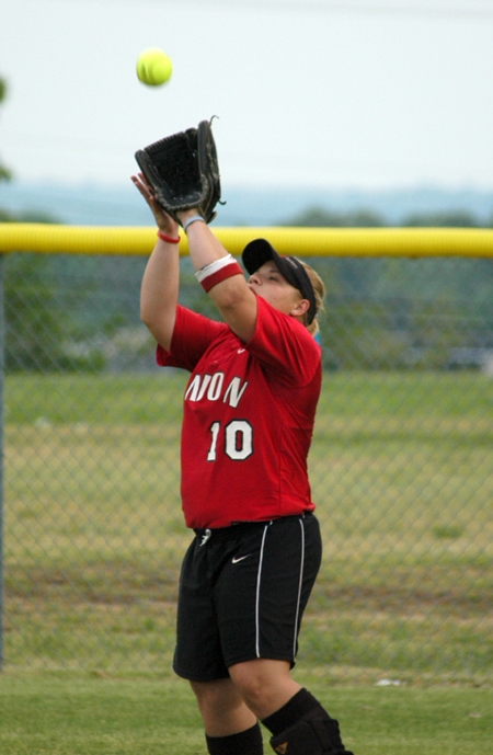 Senior right fielder watches the ball all the way into her glove for a putout in Union's double header versus Trevecca Nazarene at Fesmire Field. - Photo by Steven Aldridge