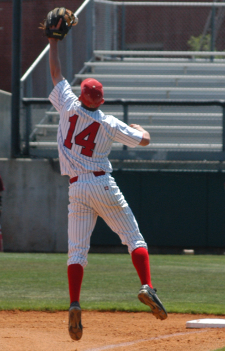 Sophomore James Brasfield skies to make a play on a high chopper down the third base line.  Brasfield mad the switch from second to third in 2006. - Photo by Steven Aldridge