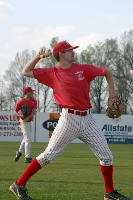 Second baseman Jason Cooper loosens up during practice. Cooper provides stability in the infield and strength at the plate. - Photo by Stephanie Schroeder