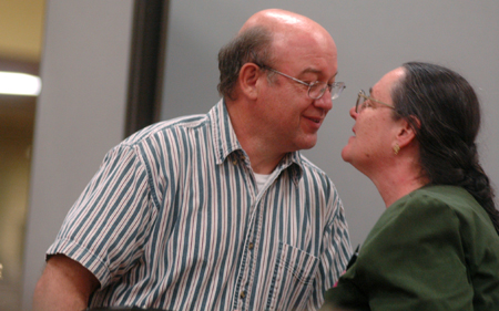 Marlyn Newhouse is congratulated by her husband Christopher after another successful West Tennessee Regional Science Fair. - Photo by Kristen Nicole Sayres