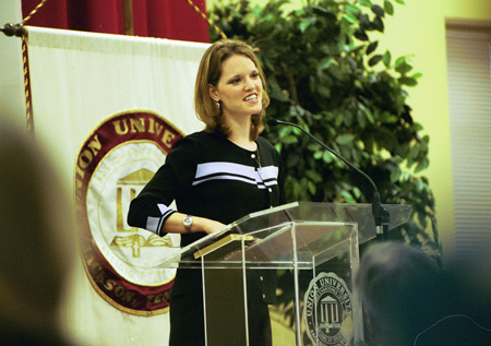 Heather Mercer describes how she experienced God during her prison experience at a banquet following the chapel service. - Photo by Jim Veneman