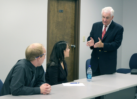 During a discussion with business students, William Pollard, former CEO of The ServiceMaster Company, challenged thought-provoking questions about faith’s role in business. - Photo by Kyle Kurlick