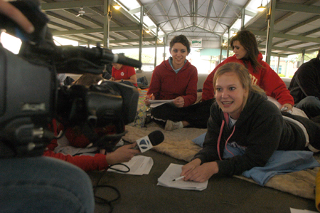 Katie Tipton talks with WBBJ during the Global Night Commute as Laura Berkemeyer and Camille Ransdell look on. - Photo by Heather Phillips